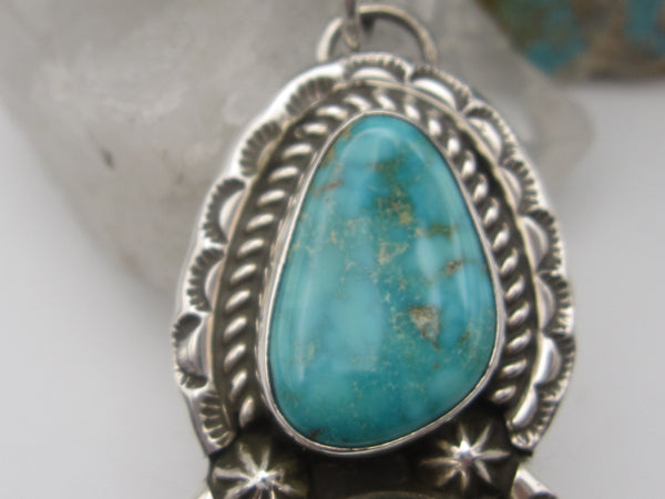 Native American Turquoise and Silver Pendant. Stamped fashion T B